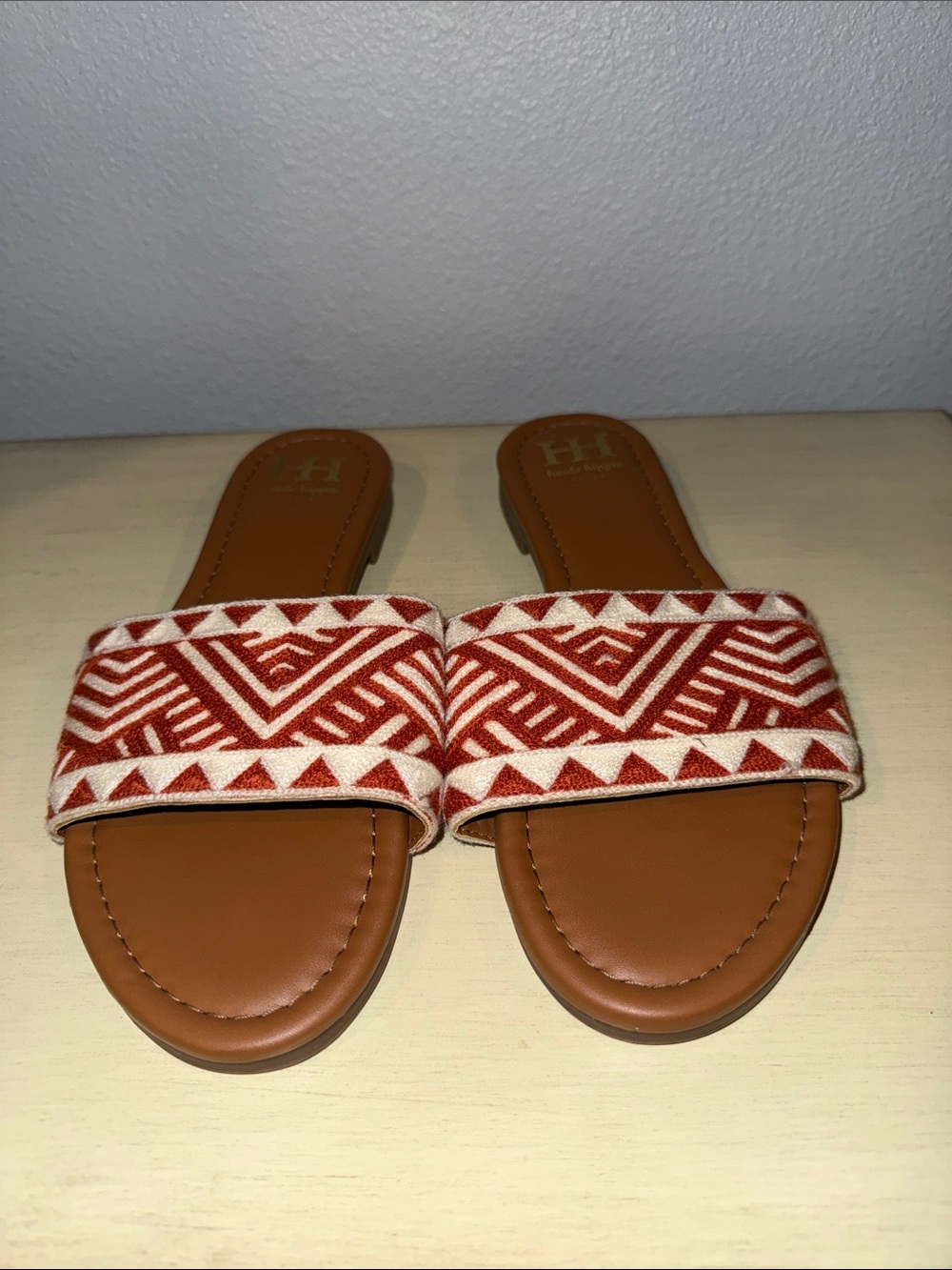 Haute Hippie Tan Slide Sandals with burnt orange Aztec design. #1000-10